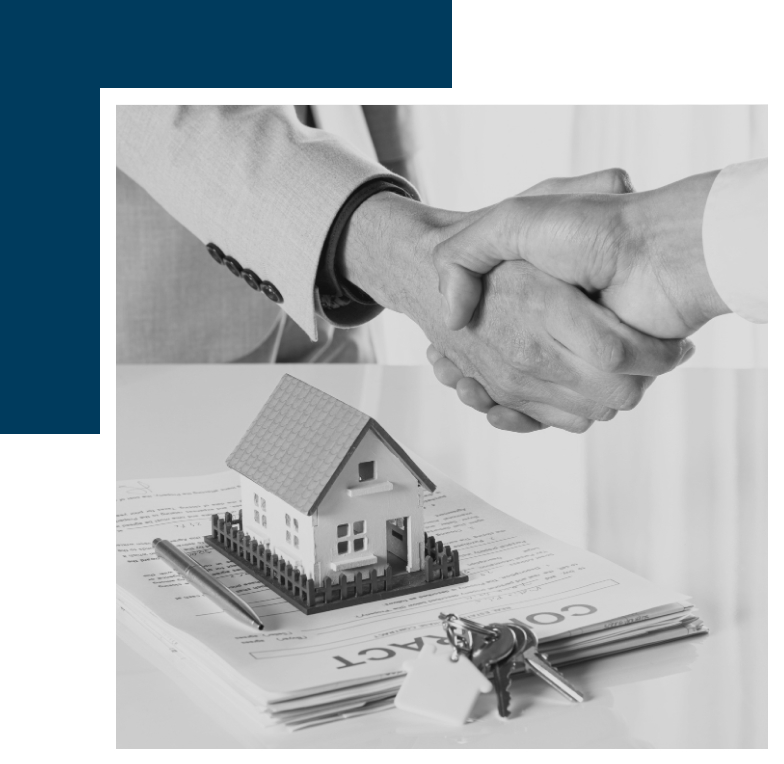 Shaking hands over a real estate agreement